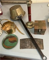 Collection of decorative brass and copper items.
