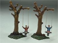 PAIR OF FRENCH CHILDREN ON TREE SWING