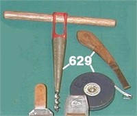 Lot: bung auger; hoof knife and a LUFKIN tape meas