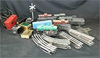 Box of Lionel Trains & Track & Power Packs