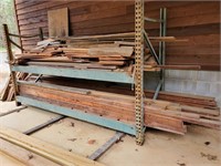LARGE LOT OF WOOD ON AND TO THE LEFT OF RACK