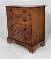 Walnut chest, solid ends, 4 graduated overlapping
