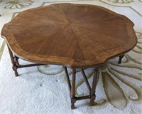 (B) Burled and scalloped wood coffee table