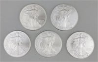 5 2010 One Ounce Fine Silver Eagles.