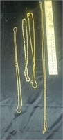 Grouping of 4 costume necklaces