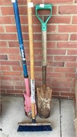 2 narrow shovel head tools and push broom