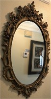 F - OVAL FRAMED WALL MIRROR 34"L (A36)