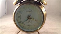 vintage brass alarm clock