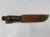 WWII fighting knife in leather sheath