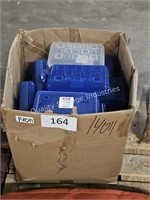 box of plastic pencil cases