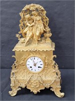 Antique French gilt metal mantel clock