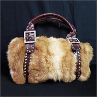 Designer style faux fur handbag