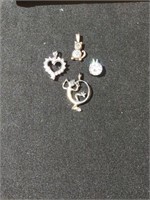 Group of 4 sterling pendant charms