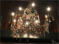 Metal base chandelier with beads and prisms. 24x24