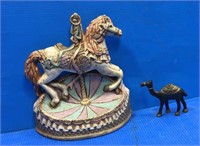 Brass camel, cast iron carousel ??horse