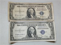 OF)  Two 1935 $1 silver certificates