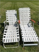 Two lounge lawn chairs