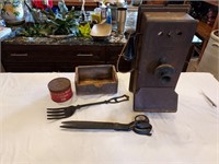 Grouping- Western Electric phone, cast iron fork,