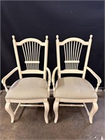 2 cream upholstered armed kitchen chairs