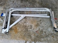 Ladder racks and ladder stabilizers