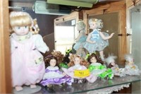 7 SMALL PORCELAIN DOLLS