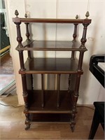 Mahogany book stand with brass inlay
