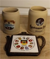 German Mugs & Cast Iron Tile Trivet