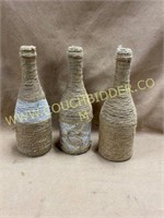 Jute twine wrapped wine bottles