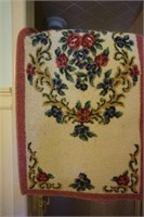 Two Floral Rugs