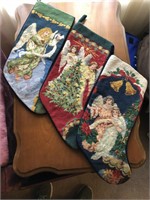Collection of Three Needlepoint Stockings