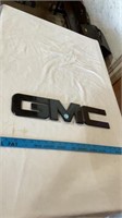 GMC metal sign.