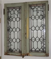 Pair of wooden frame leaded glass Tudor style wind