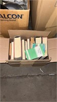 Lot of books, kitchen supplies/containers, and