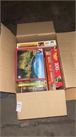 Box lot of puzzles