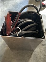 Metal container with jumper cables