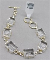 Sterling Silver bracelet with clear stones.