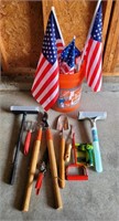Bucket of yard tools
