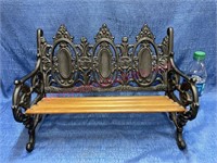 Wrought iron doll park bench