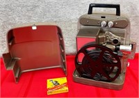 11 - VINTAGE BELL & HOWELL  MOVIE PROJECTOR (S40)