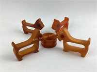 (5) Bakelite napkin rings incl. (3) Scotty dogs