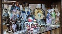 Figurines and snow globes - in china cabinet
