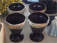 Four Pottery Beverage Dishes