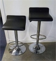 2 matching adjustable chairs