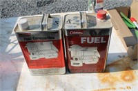 LOT OF TWO PARTIAL GAL CANS CAMP FUEL