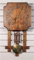 Vintage wall clock, wood and  brass pendulum with
