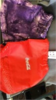 purple bag and coca cola bag