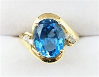 Ladies 14K Yellow Gold Blue Topaz & Diamond Ring