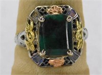 Marked 10K w gold emerald ring with yellow & rose
