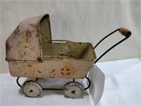 Wyandotte tin Lithograph baby carriage