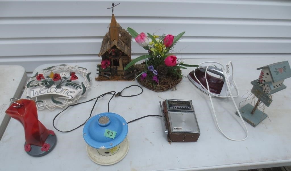 Clothes iron, bird feeders, welcome sign, misc